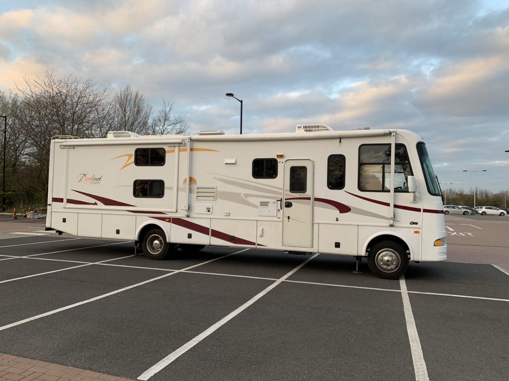 Our Rv parked across six spaces in a car park